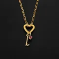 Golden stainless steel heart clasp necklace with key pendant and pink crystal detail - Letter I