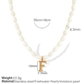 Elegant pearl necklace featuring a gold letter F pendant with 4.3mm pearls - Letter F Gold-Tone Necklace with Artificial Pearl