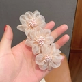 Pink camellia hair clip with shimmering organza petals and pearl center accents - Spring Clips / Pink Mesh Stamen Style