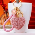 Pink rhinestone heart keychain with woven leather strap and gold-tone finish charm - Pink Fortune Rope + Pink Heart