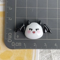 Detail showing a 3.5cm white resin ghost with black wings on a measurement scale - 7* Black Wing Horn Ghost