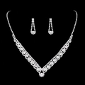 Detailed view of silver bridal jewelry set with sparkling rhinestones on black background - Silver-Two-piece set