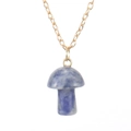 Detail of a natural blue spotted stone mushroom pendant on a delicate gold metal chain - Blue Sodalite