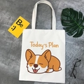 Close-up of a cream canvas tote bag with a cute Corgi print and Today's Plan text - Today's Plan Corgi