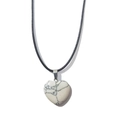 Macro detail of white turquoise heart pendant with black texture on black wax cord - 20mm Pendant + 40cm Leather Cord / Howlite