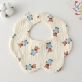 Detail of petal-shaped muslin cotton baby bib with cute cartoon bear pattern - Gauze Flower Wrap - Blue Bear