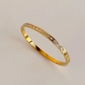 Elegant gold-plated bangle featuring channel-set baguette-cut cubic zirconia stones - Baguette Cut Arrangement / 1# Gold