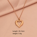 Rose gold stainless steel necklace with heart-shaped angel wings pendant on pink silk - Rose Gold Large Hollow Heart Style (LT001MP696)