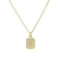 Detailed macro view of the gold plated rectangular pendant featuring letter G and zircons - Necklace G
