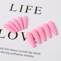 Detail of pink matte coffin press on nails in a professional flat lay arrangement - Pink