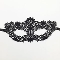 Classic black lace masquerade mask with intricate patterns and elegant side ribbon ties - Six-Petal Flower
