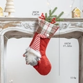 Knitted Christmas stocking with Santa Claus doll and green plaid cuff hanging by fireplace - Style B Rudolph Red Christmas Stocking