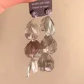 Detailed macro view of long silver leaf tassel earrings with sparkling purple crystals - 10# 925 Sterling Silver Earring Post - Silver - Rhinestone Hollow Flower Stud Earrings