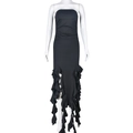 Detail of waist cut-out and layered ruffle fishtail hem on black bodycon maxi dress - S / Black