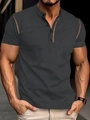 Dunkelgraues Herren-Poloshirt mit Strickstruktur und dekorativem Kupfer-Besatz - S / Dunkelgrau