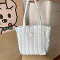 Detailed close-up of blue and white striped bubble texture fabric on a tote bag - Blue and White Bubbles