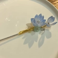 Elegant gold hairpin with blue transparent lotus flowers and a central pearl accent - Blue Lotus Flower Hair Stick