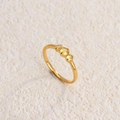 Minimalist gold titanium ring featuring three sparkling yellow round-cut crystals - Gold Yellow Zirconia