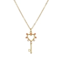 Golden key necklace with heart-shaped cutout pendant and red-pink cubic zirconia gems - Hollow Heart Key / Gold