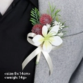 Groom boutonniere with white lily, red flowers and beige ribbon on grey suit jacket - Honey White