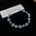Détail du bracelet en argent avec pierres de zircone vert émeraude et blanches élégantes - Style 55# Argent Bleu Tennis