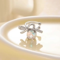 Silver bow ear cuff with octagonal shimmering zircon and small accent crystals - Right Ear / Iridescent (Moonlight)
