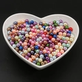 Colorful mixed ABS faux pearl beads in a heart-shaped bowl for DIY jewelry making - 10mm Diameter (Approx. 50 Pieces/Pack) / Random Mixed Colors