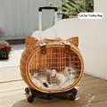 Light brown woven pet carrier trolley with cat ear design for dogs and cats up to 10kg - Cat-shaped Rattan Trolley Case / Natural Wood Color