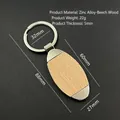 Beech wood and zinc alloy keychain variant with 88mm length and 5mm thickness specs - Ellipse