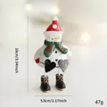 Handcrafted snowman metal ornament with red hat and scarf, dimensions 10x5.5 cm - White Snowman Desktop Ornament