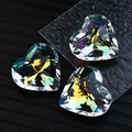Three AB coated heart-shaped crystals with multifaceted iridescent reflections - 45MM Heart Shape / Rainbow AB