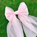 Fiocco gigante in chiffon plissettato rosa appoggiato sull'erba verde naturale - 46cm*84cm / Rosa