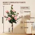 Detailed view of realistic pink camellia artificial plant with dark green leaves - Pink