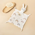 Close-up of baby rabbit comforter with rainbow prints and soft cotton gauze fabric - Rainbow