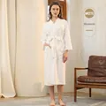 Women's white waffle knit bathrobe with V-neckline and waist tie for spa and home - Women-White