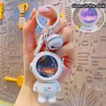 Luminous astronaut keychain with glowing star face mask and matching bell decoration - Glowing Astronaut-Silver