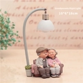 Elderly couple on sofa miniature night light figurine with flexible stem and white shade - Old Couple Figurine / 1041-12 Holding Cat Night Light