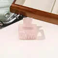 Pink mother-of-pearl textured hair claw clip with rectangle design on wooden tray - 5cm Square / PVC 5cm Square - Iridescent Pink
