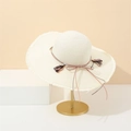 Summer wide brim straw sun hat with decorative frayed edges and colorful tassel bow - M (56-58cm) / Cream