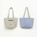 Detail of dual-style canvas tote bags showing letter print and nautical blue stripes - 33*27.5cm / Grey Stripe Reversible