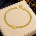Gold braided mesh chain necklace featuring a 3D heart pendant on a neutral stand - Textured Heart Pendant Mesh Necklace (N3436)