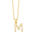 Close-up of gold initial M pendant with embedded pearls on a dainty O-chain link - Gold Letter M