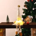 Golden Christmas gnome doll with warm LED light and striped legs in cozy festive scene - Long Leg Style / Gold Long Leg Style B (Leaf Texture)