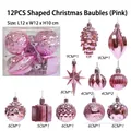 12-piece pink Christmas ornament set featuring diverse shapes like stars and pinecones - 12 Uniquely Shaped Christmas Balls (pink)