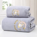 Detail of coral fleece towel featuring embroidered moon rabbit and plush texture - Moon Rabbit Grey