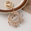 Portachiavi a forma di granchio dorato con strass AB iridescenti e gancio a scatto - Bianco Iridescente
