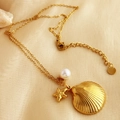 Golden ocean series necklace featuring shell pendant, starfish charm and white pearl - Shell Pearl Necklace - Gold
