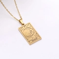 Golden tarot necklace featuring The Moon rectangular pendant in a vintage minimalist style - The Moon
