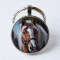 Round silver alloy keychain featuring a realistic brown horse head glass gem pendant - Brown and White Horse Realistic