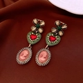Detailed macro view of vintage cameo earrings with green hearts and red gems on silk - Vintage Portrait Heart Earrings (Gold-Green Silver Pin)